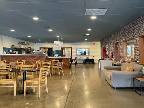 Cozy cafe interior with seating and counter