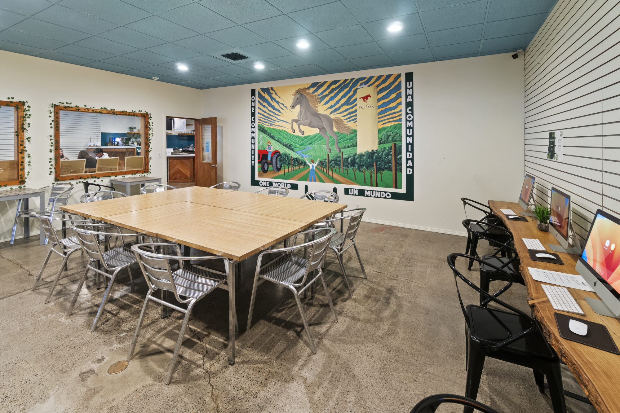 Meeting room with mural and computers