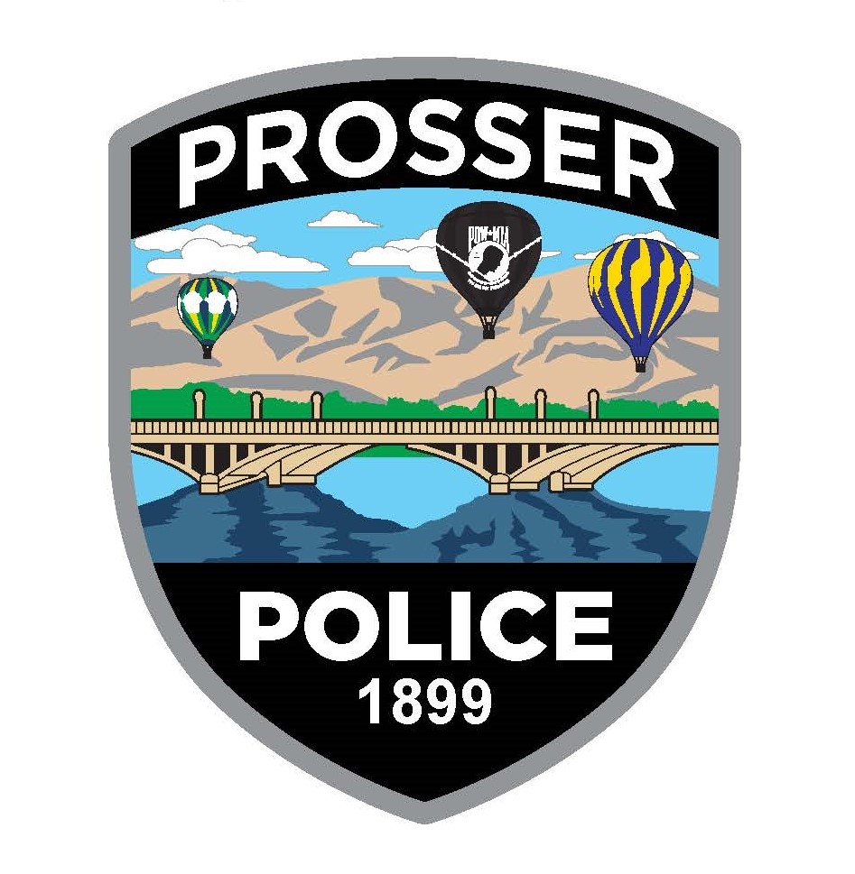Prosser Police Department emblem with balloons and bridge.